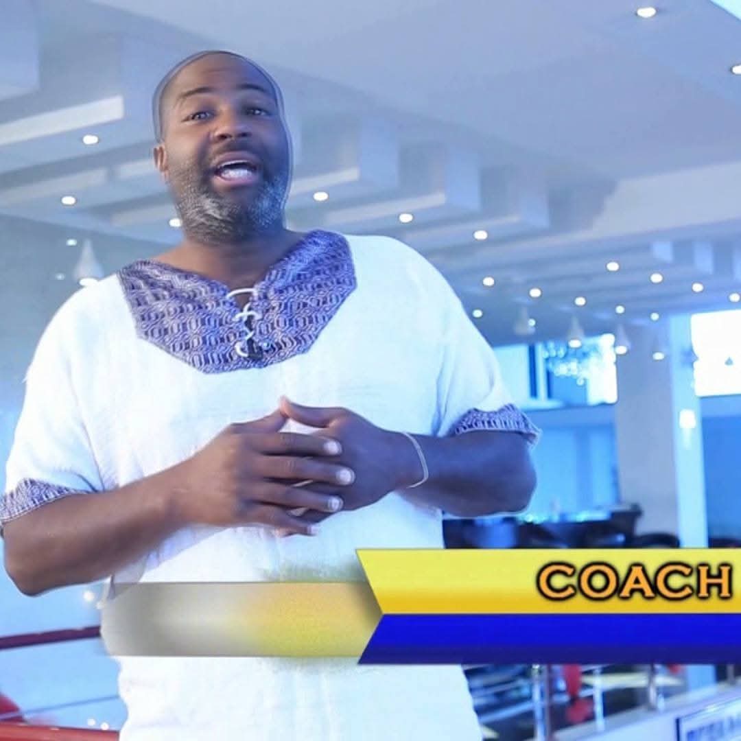 Coach Carlos speaking during a broadcast segment