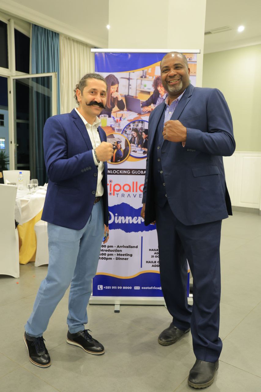 Coach Carlos pictured with a guest at a Tripolla event